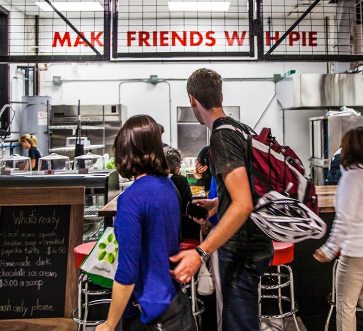 A couple explores Victoria Public Market in Victoria, BC