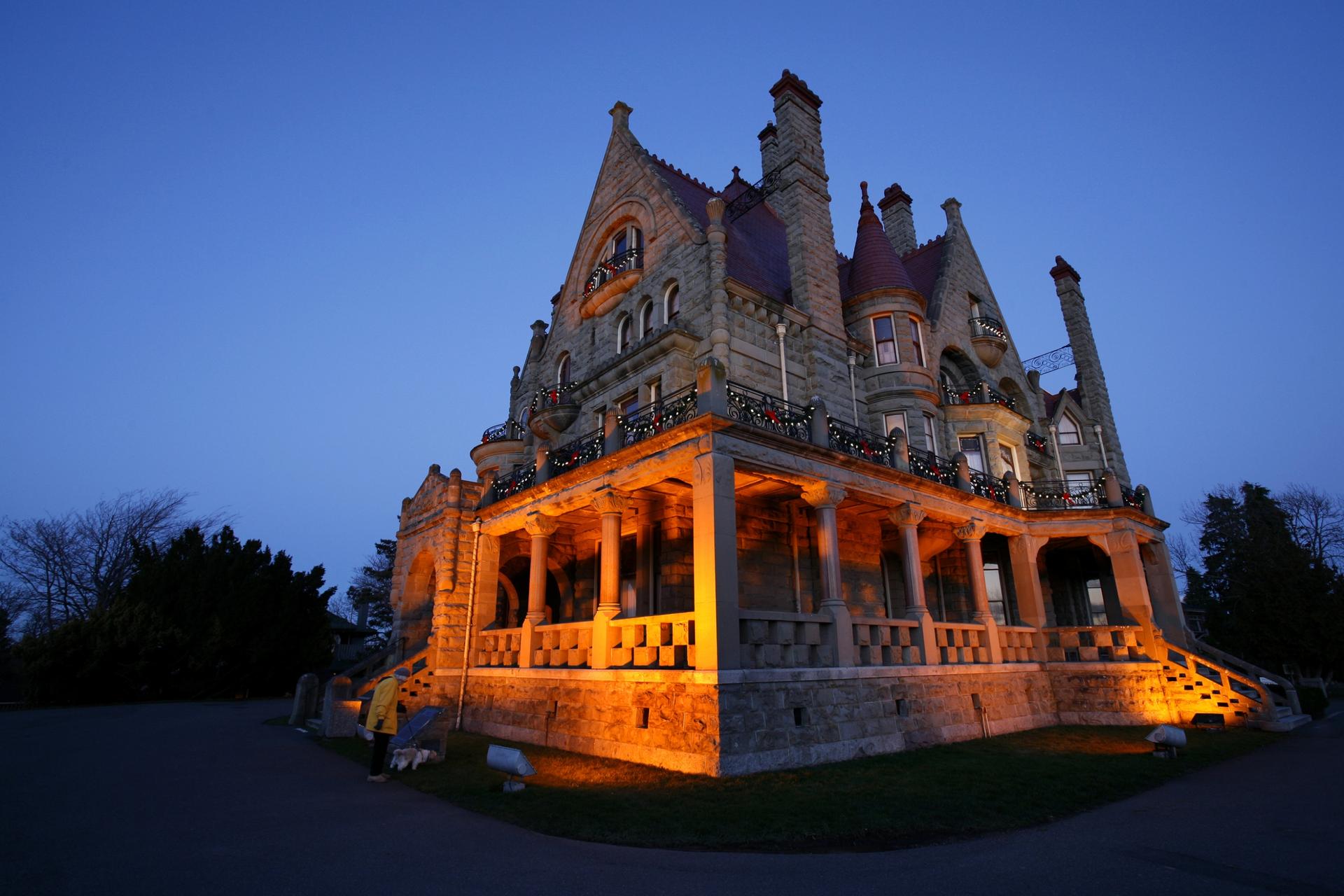 Craigdarroch Castle illuminated at sunset in Victoria, BC