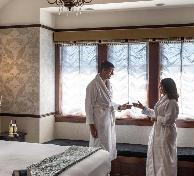 A couple celebrates their arrival at Abigail's Hotel in Victoria, BC