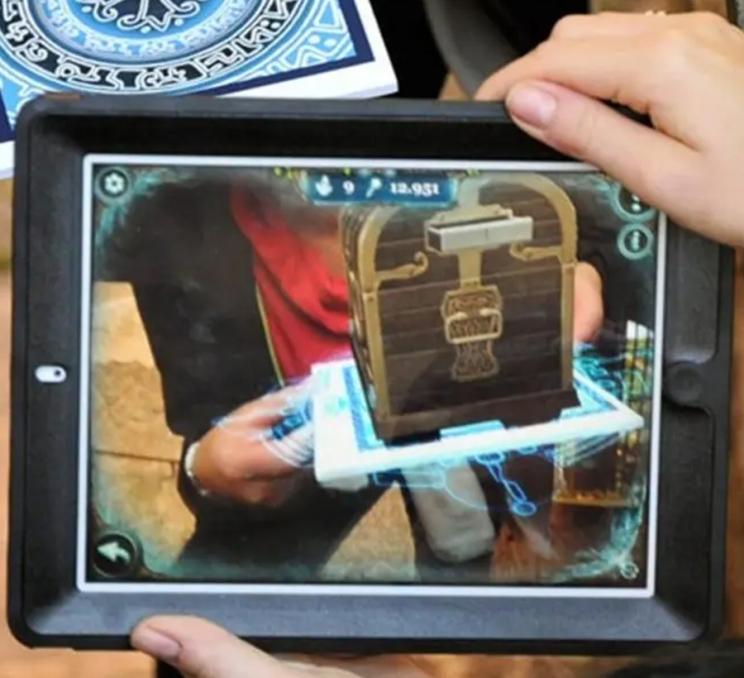 Folks play an AR game with Quest Reality Games in Victoria, BC