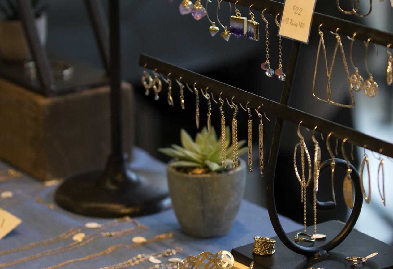 Jewellery, necklaces, and rings on display at a beautiful artisan market