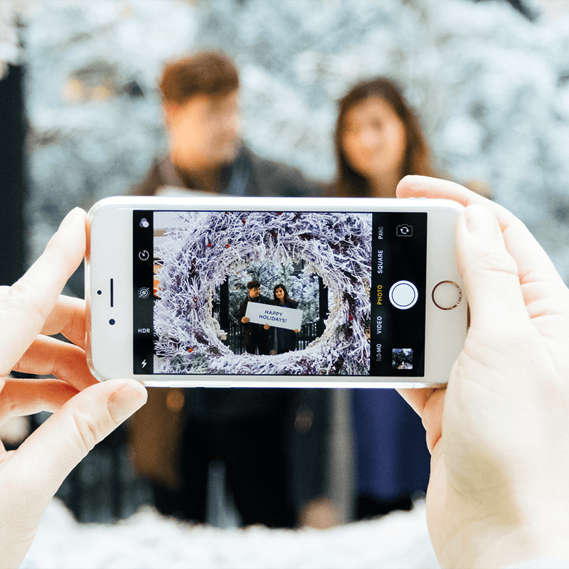 A Couple Poses for A Snap Shot at the Winter Wonderland at The Bay Centre