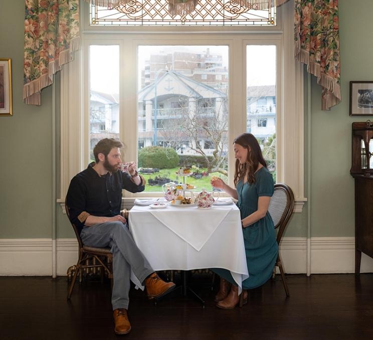 A young couple enjoys afternoon tea at the Pendray Inn and Teahouse