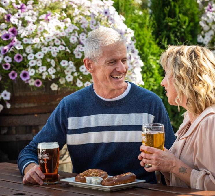 Two people enjoying the food tour in Victoria