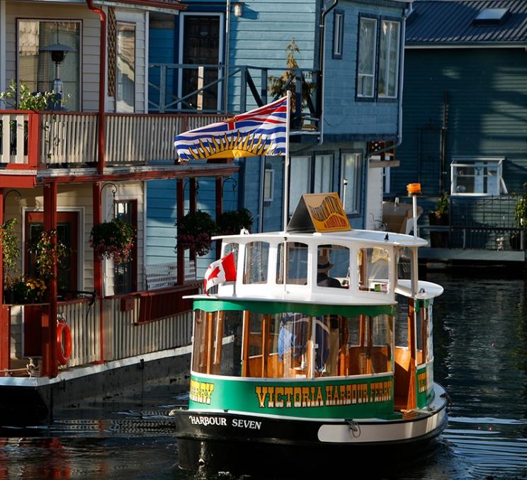 A Victoria Harbour Ferry departs the Fisherman's Wharf Neighbourhood