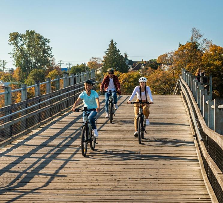 A group of friends cycle in Greater Victoria