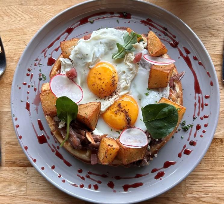 A duck and egg waffle at House of Boateng in Victoria, BC