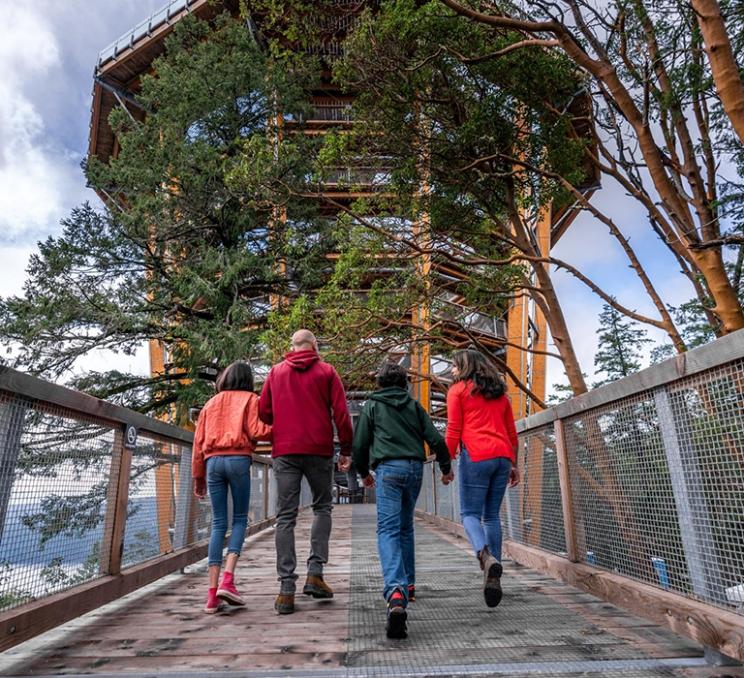 A family approaches the tower of the Malahat SkyWalk in Victoria, BC