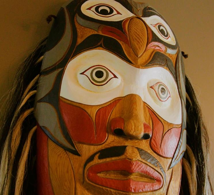 A carved mask of the Songhees Nation