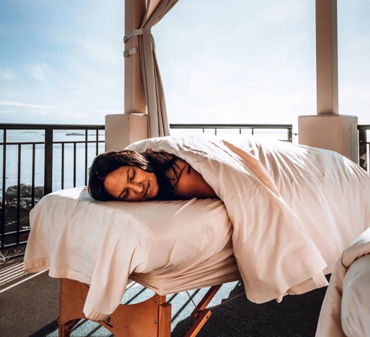 A woman prepares for a seaside massage at The Boathouse Spa in Victoria, BC