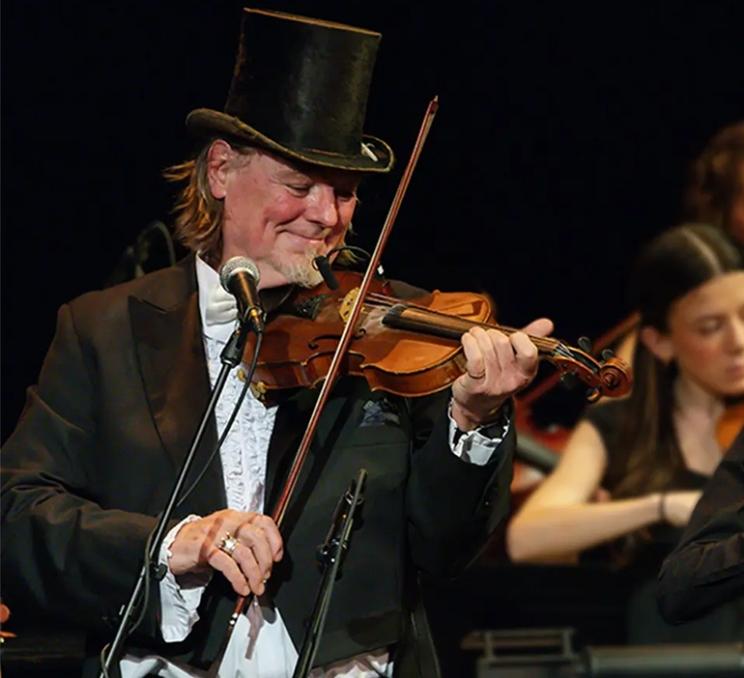 A musician plays a holiday concert in Victoria, BC