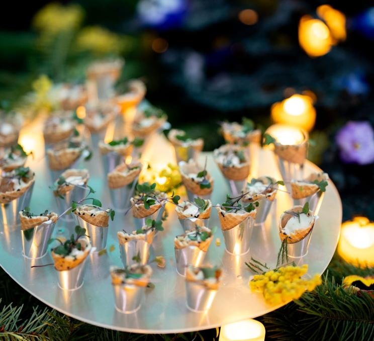 Delicious tray of hors-doeuvres plated delightfully in delicate waffle cones and plated on a silver tray for the Dine Around Gala Launch in Victoria.