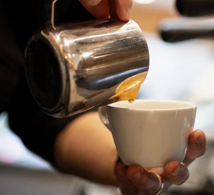 An espresso is poured at Fernwood Coffee in Victoria, BC