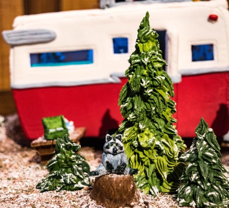 A display of a raccoon and a camper van at the Gingerbread Showcase in Victoria, BC