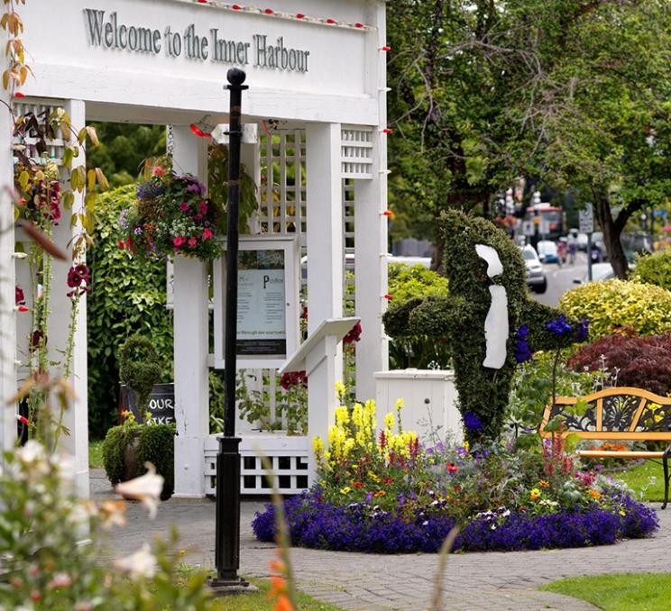 The entrance way of the Huntingdon Manor Hotel in Victoria, BC is adorned with greenery and gardens