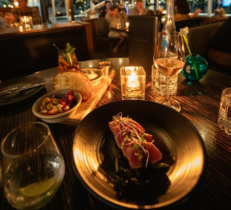 A meal served at a candlelit dinner at Boom + Batten in Victoria, BC