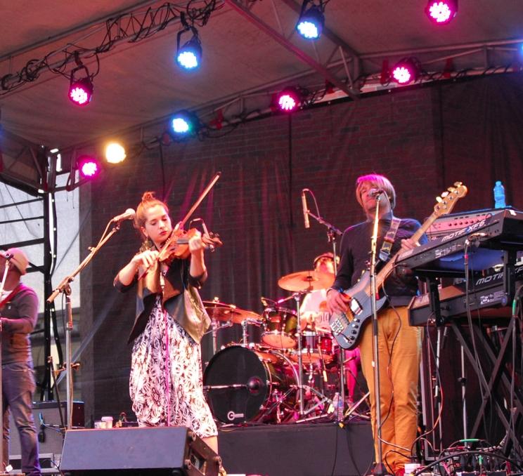 A fiddler and a bass player take the stage at the Victoria International Jazz Fest in Victoria, BC