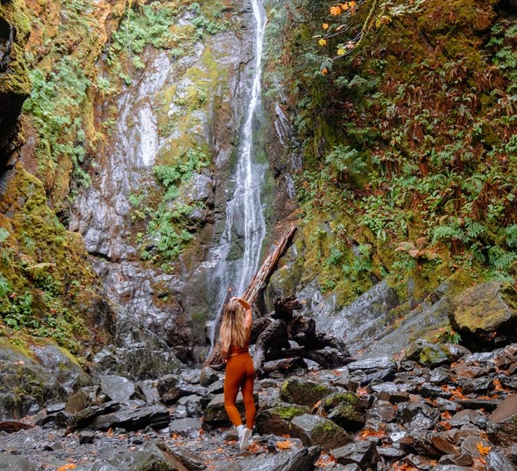 A woman takes in the view of Niagara Falls at Goldstream Provincial Park in Victoria, BC